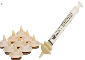 A plastic tube with a set of plastic cones and a Miracle Nipple Mini - Pkg/2 or Pkg/10 with one 3ml Oring Syringe.